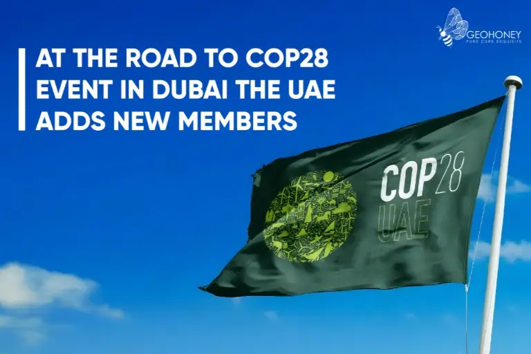 A banner with the text "UAE Alliance for Climate Action" in large letters at the top. COP28